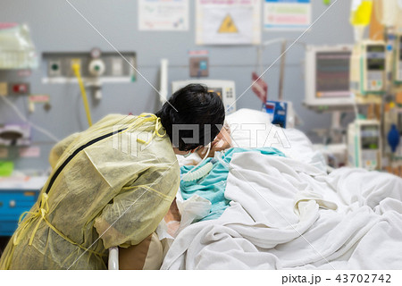 Patient relative taking care of the elder patient 43702742