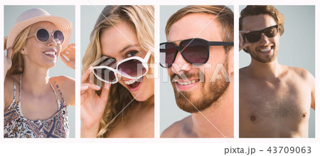Composite image of beautiful girl with straw hat and sunglasses Composite image of beautiful girl with straw hat and sunglasses 43709063