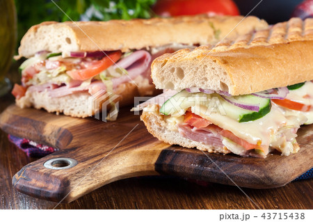 Toasted sandwiches with ham, cheese and other Toasted sandwiches with ham, cheese and other 43715438