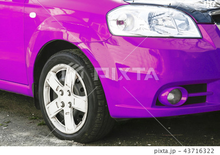 Wing, wheel and car headlight bright color, close Wing, wheel and car headlight bright color, close 43716322