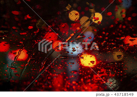 Raindrops on windshield and bokeh lights  43718549