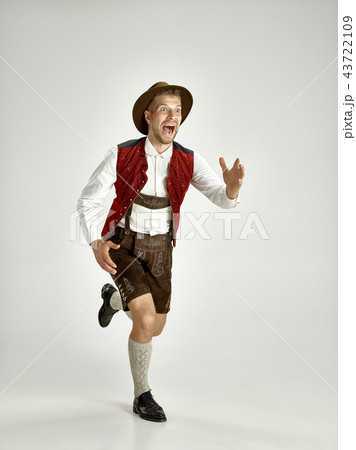 Portrait of Oktoberfest man, wearing a traditional Bavarian clothes Portrait of Oktoberfest man, wearing a traditional Bavarian clothes 43722109