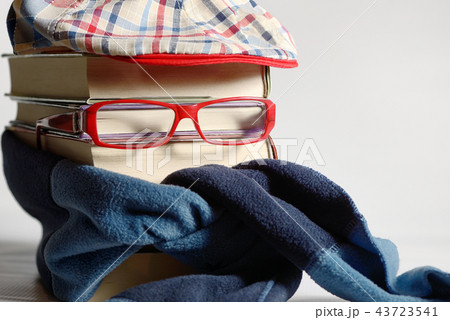 Reading glasses with books and neckerchief 43723541