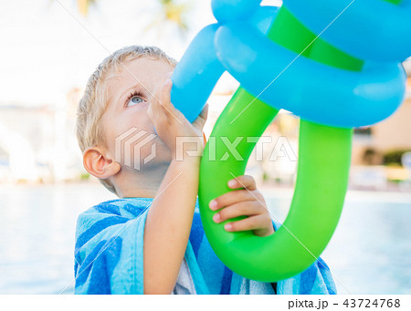 wonderful child plays with balloons wonderful child plays with balloons 43724768