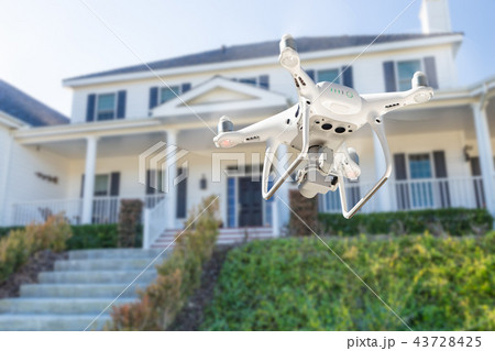 Drone Quadcopter Inspecting, Photographing House 43728425