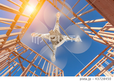 Drone Quadcopter Inspecting, Photographing House Drone Quadcopter Inspecting, Photographing House 43728450