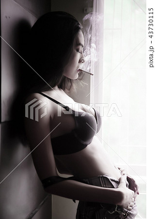 Smoking girl in bikini 43730115