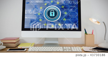 Composite image of desktop pc and various office accessories on table Composite image of desktop pc and various office accessories on table 43730186