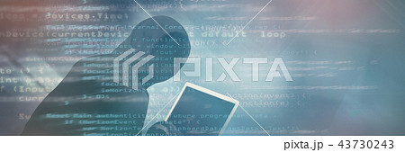 Composite image of hacker using laptop 43730243