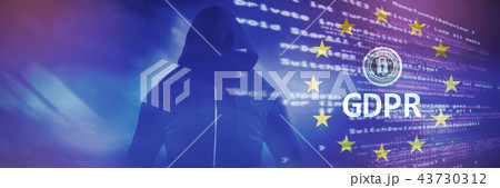 Composite image of male hacker wearing black hoodie while standing Composite image of male hacker wearing black hoodie while standing 43730312