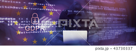 Composite image of male hacker using laptop Composite image of male hacker using laptop 43730337