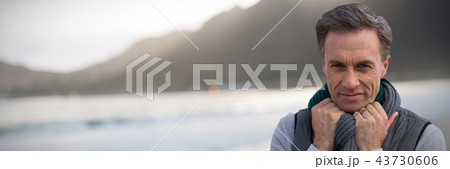 Composite image of portrait of handsome mature man 43730606