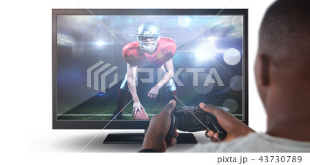 Composite image of man playing video game against white background 43730789