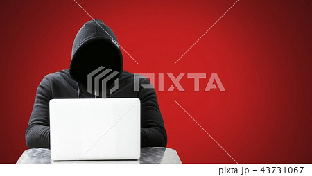 hacker on laptop with red danger background hacker on laptop with red danger background 43731067