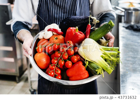chef with vegetables 43731632