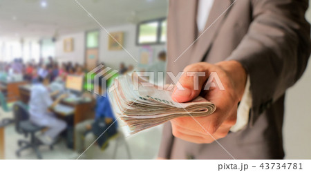man in suit showing money 43734781