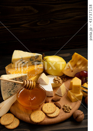 Different types of cheeses on a blackboard 43737138