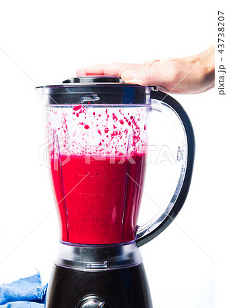 Healthy beetroot smoothie mixing in a blender Healthy beetroot smoothie mixing in a blender 43738207
