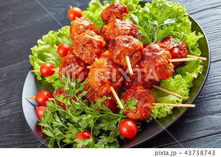 close-up of roasted meatballs on skewers 43738743