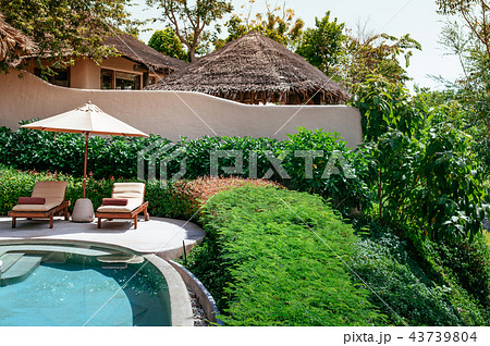 Tropical resort villa pool, beach bed in Phuket 43739804