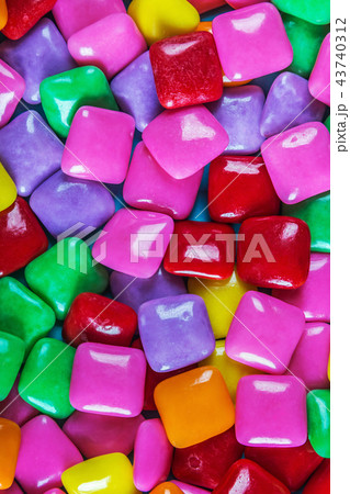 chewing gum of different colors. background chewing gum of different colors. background 43740312