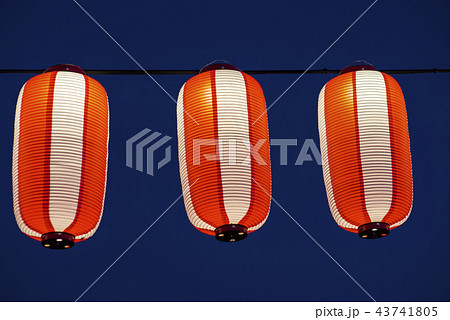 Orange paper lanterns strung in a line on festival Orange paper lanterns strung in a line on festival 43741805