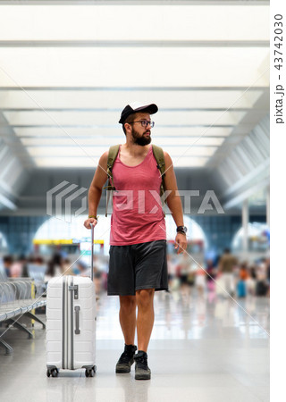 Man arriving his destination on the train station 43742030