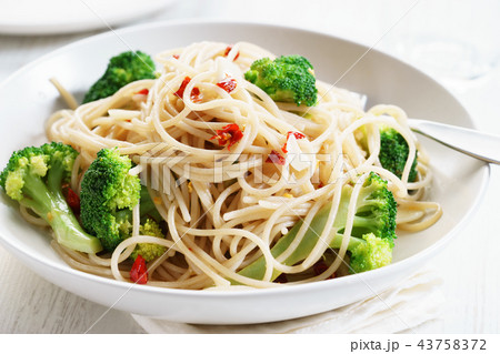 spaghetti broccoli on white plate 43758372