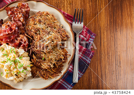 Hash browns. Potato pancakes Hash browns. Potato pancakes 43758424