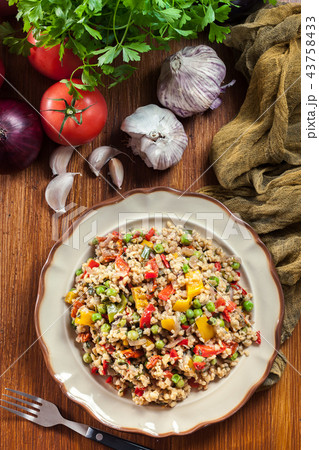 Bulgur salad with vegetables Bulgur salad with vegetables 43758433