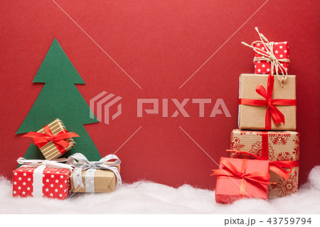 pile of christmas gifts red background with copyspace pile of christmas gifts red background with copyspace 43759794
