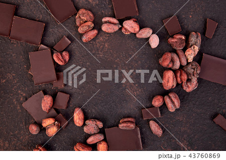 Cocoa beans background. Cocoa beans background. 43760869
