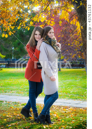 Two beautiful girlfriends on a sunny autumn day 43761132
