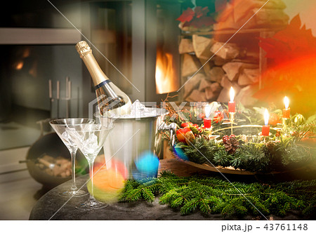 Champagne glasses fireplace Candlelight dinner Champagne glasses fireplace Candlelight dinner 43761148