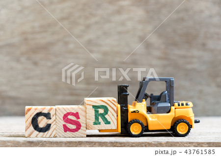 Toy forklift hold letter block R in word CSR Toy forklift hold letter block R in word CSR 43761585