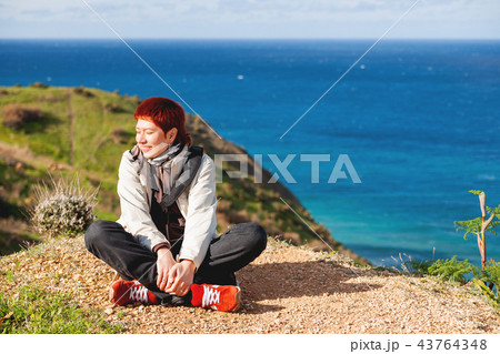 Happy wide smiling redhead women, Gozo, Malta. 43764348
