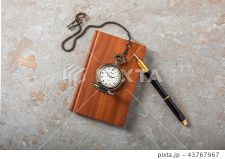 Diary with fountain pen and vintage pocket watch Diary with fountain pen and vintage pocket watch 43767967