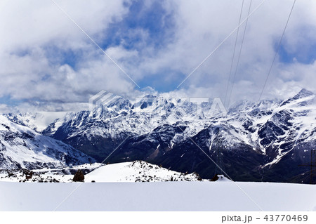 Caucasus mountains under fluffy snow 43770469