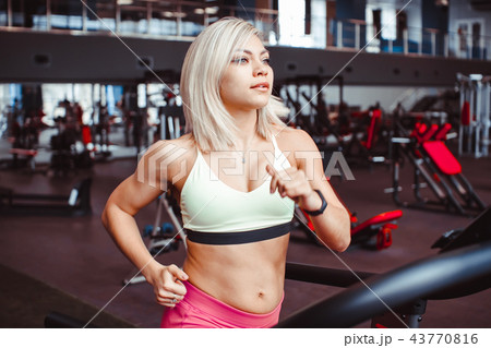 woman on the treadmill woman on the treadmill 43770816
