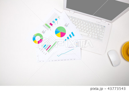 Modern office workplace with notebook, reports Modern office workplace with notebook, reports 43773543