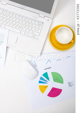 Modern office workplace with notebook, reports Modern office workplace with notebook, reports 43773560