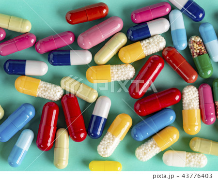 Different medicine capsules and pils 43776403