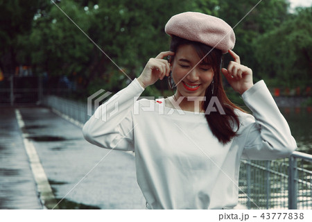 Beautiful woman smiling for take a selfie photo 43777838