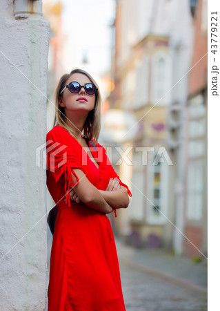 Young lady in dress on medieval street of Bremen 43779221