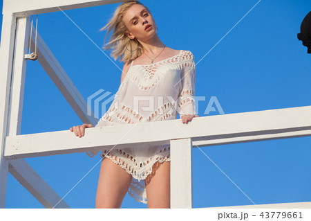Portrait of beautiful girl in lingerie on the Beach Ocean Portrait of beautiful girl in lingerie on the Beach Ocean 43779661