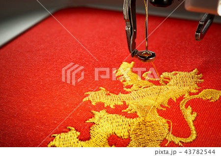 Close up image of embroidery machine and embroider 43782544