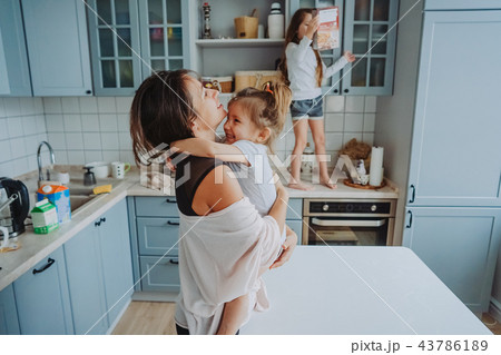 Happy family having fun in the kitchen 43786189