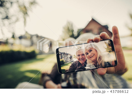 Hilarious laughing mature twosome creating mutual photo 43786612