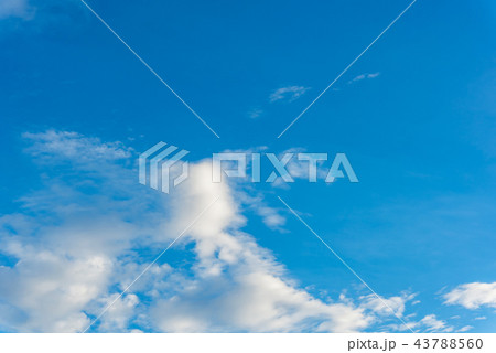 Beautiful cirrus clouds against the blue sky Beautiful cirrus clouds against the blue sky 43788560