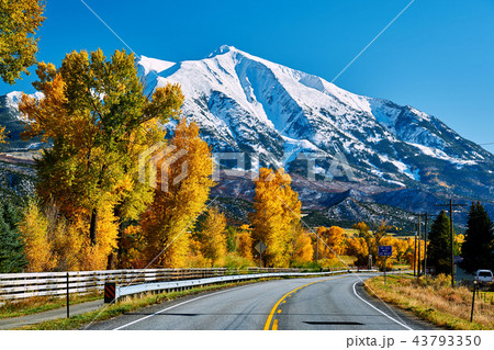 Highway in Colorado Rocky Mountains at autumn Highway in Colorado Rocky Mountains at autumn 43793350